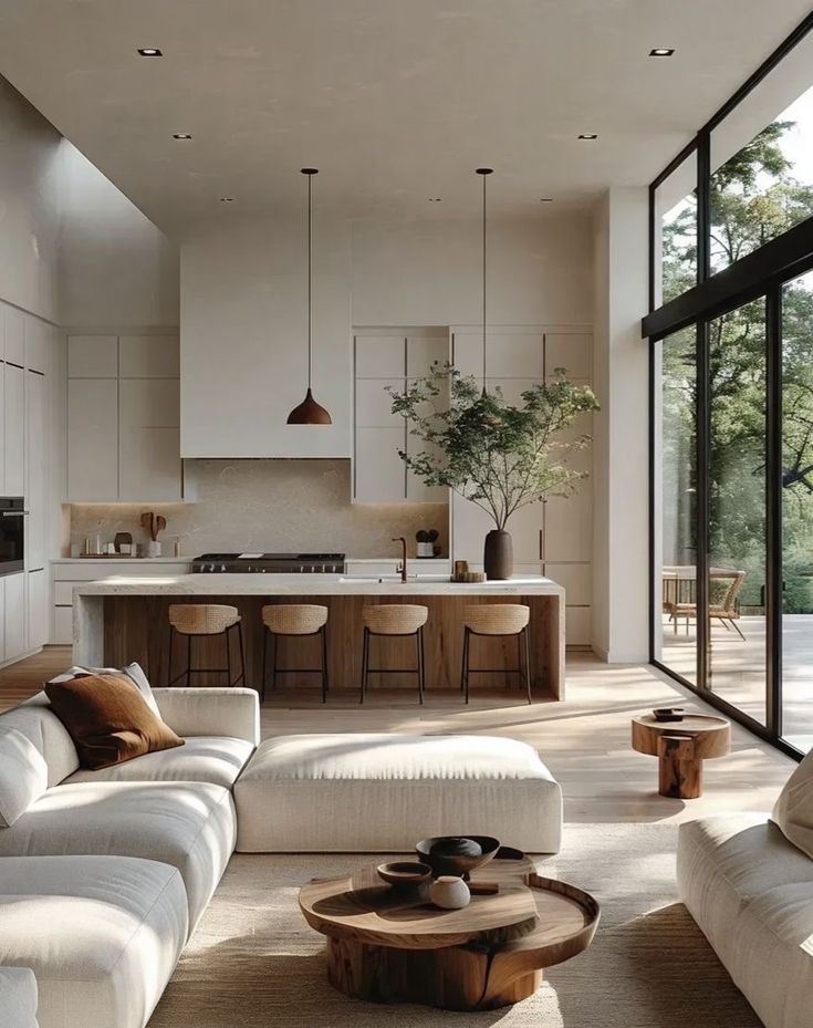 _ 7 Modern open-plan living room and kitchen with minimalist design, cozy seating, natural light, and stylish decor elements. | Sky Rye Design Modern open-plan living room and kitchen with minimalist design, cozy seating, natural light, and stylish decor elements.