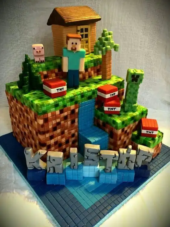 _ 8 Minecraft-themed cake with pixelated blocks, a character, TNT, Creeper, and pig on grassy layers, with a small house and waterfall. | Sky Rye Design Minecraft-themed cake with pixelated blocks, a character, TNT, Creeper, and pig on grassy layers, with a small house and waterfall.