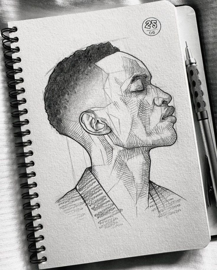 982881a9-f4a2-4f30-acf0-ab5fe82f6175 Sketch of a person in profile view on a spiral-bound notebook, accompanied by a mechanical pencil. Monochrome pencil art. | Sky Rye Design Sketch of a person in profile view on a spiral-bound notebook, accompanied by a mechanical pencil. Monochrome pencil art.