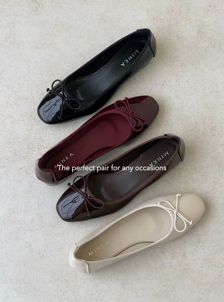 Ballet Flats Four pairs of elegant ballet flats in black, burgundy, brown, and beige, displayed on a light surface. Perfect for any occasion. | Sky Rye Design Four pairs of elegant ballet flats in black, burgundy, brown, and beige, displayed on a light surface. Perfect for any occasion.