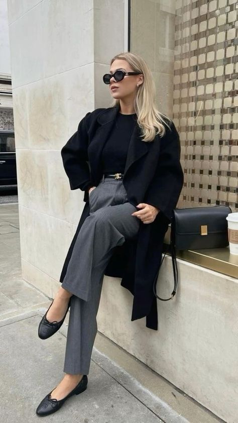 Ballet flats 1 Stylish woman in a black coat and sunglasses sits against urban backdrop, holding coffee and handbag, embodying chic street fashion. | Sky Rye Design Stylish woman in a black coat and sunglasses sits against urban backdrop, holding coffee and handbag, embodying chic street fashion.