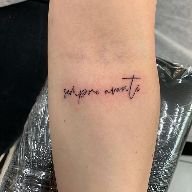 Beautiful-Tattoo-Fonts Minimal script tattoo reading sempre avanti on forearm, symbolizing moving forward and perseverance. | Sky Rye Design Minimal script tattoo reading sempre avanti on forearm, symbolizing moving forward and perseverance.
