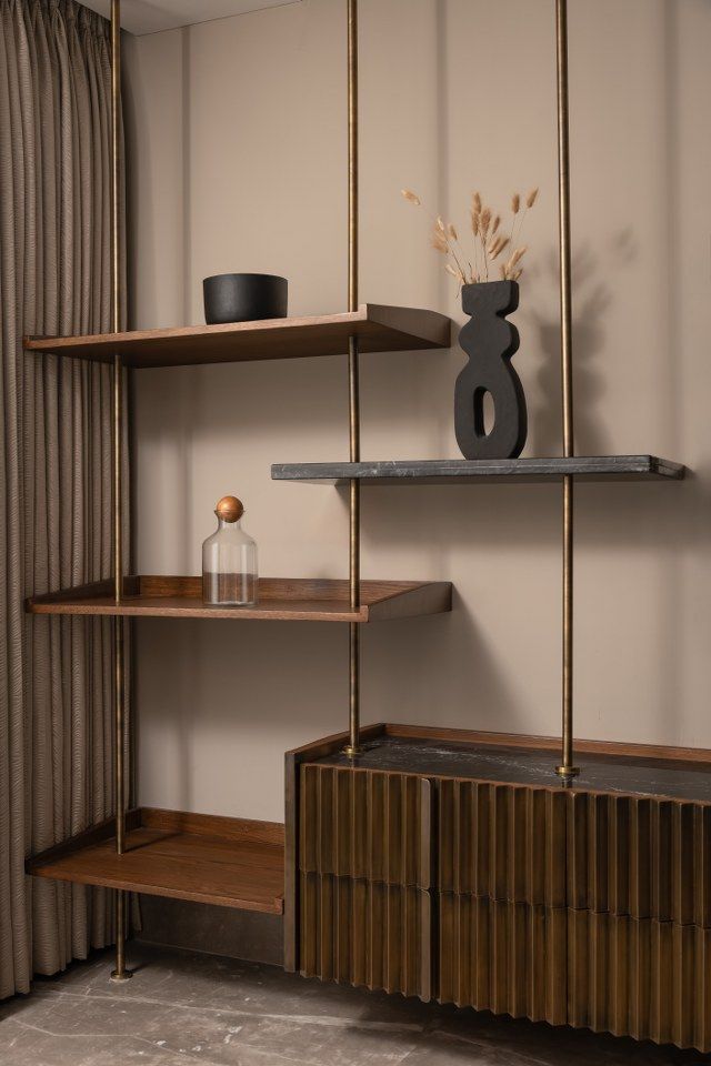 Blend Of Abstract Artworks And Soothing Zen Blue Colour Tones _ The Melange Studio Modern minimalist shelving with rustic wood, metal accents, and decorative vases in a stylish interior. | Sky Rye Design Modern minimalist shelving with rustic wood, metal accents, and decorative vases in a stylish interior.