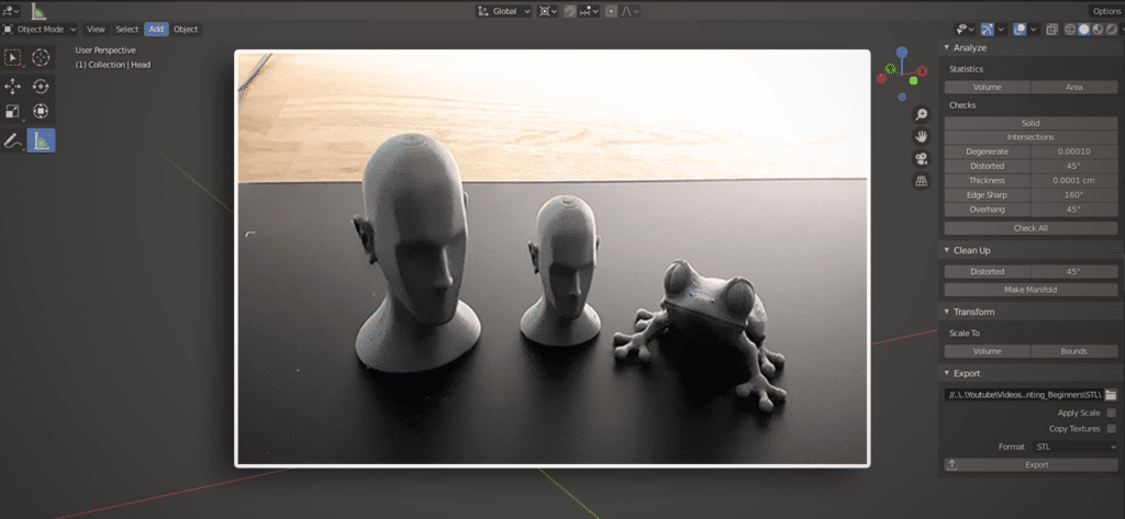 Blender_28_3D_Printing_Getting_Started_raw 3D model display in Blender: Two head busts and a frog figure on a black surface with Blender interface visible. | Sky Rye Design 3D model display in Blender: Two head busts and a frog figure on a black surface with Blender interface visible.