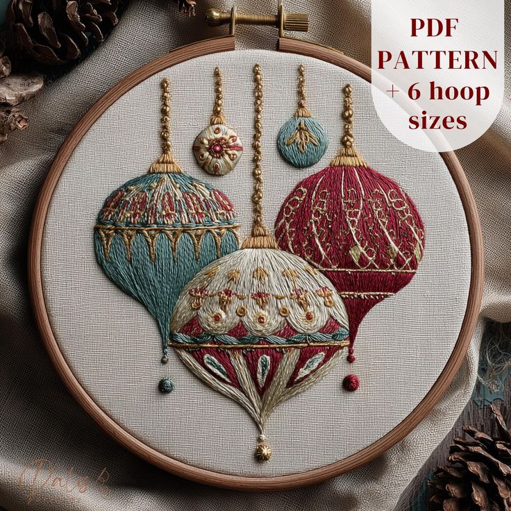 Christmas Baubles Embroidery Pattern Christmas Hand Embroidery Design Festive Embroidery PDF Temp Embroidery hoop featuring intricate Christmas ornament designs in red and green with PDF pattern and six hoop sizes available. | Sky Rye Design Embroidery hoop featuring intricate Christmas ornament designs in red and green with PDF pattern and six hoop sizes available.