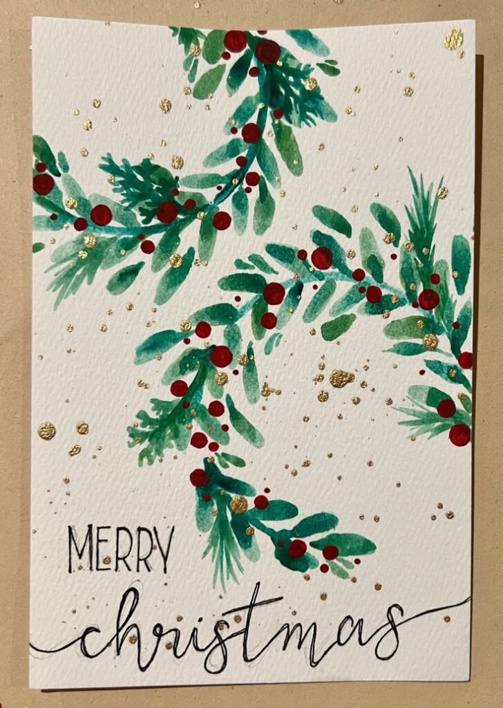 DIY Watercolor Christmas Card - Wreaths Watercolor Christmas card with green foliage, red berries, gold accents, and Merry Christmas text on textured paper. Festive holiday design. | Sky Rye Design Watercolor Christmas card with green foliage, red berries, gold accents, and Merry Christmas text on textured paper. Festive holiday design.