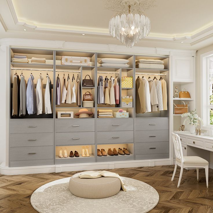 Freestanding 48_ Closet System With 5 Wood Drawers Set Of 2 Finish_ Gray Luxury walk-in closet with elegant lighting, organized clothes, and accessories. Chic neutral tones for a sophisticated style. | Sky Rye Design Luxury walk-in closet with elegant lighting, organized clothes, and accessories. Chic neutral tones for a sophisticated style.