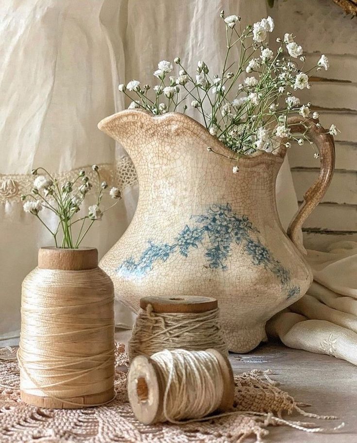 Instagram Vintage ceramic pitcher with delicate flowers beside spools of rustic twine on a lace doily. Cozy, antique home decor. | Sky Rye Design Vintage ceramic pitcher with delicate flowers beside spools of rustic twine on a lace doily. Cozy, antique home decor.