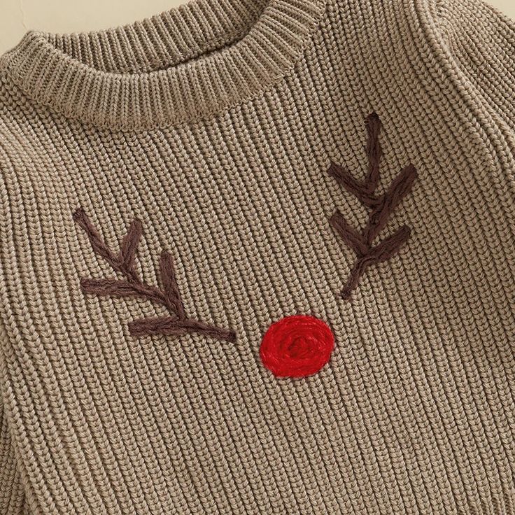 Knitted Embroidery Christmas Sweater - White _ 2-3 Toddler Cozy beige knit sweater featuring cute reindeer face design with red nose and antler embroidery, perfect for festive winter wear. | Sky Rye Design Cozy beige knit sweater featuring cute reindeer face design with red nose and antler embroidery, perfect for festive winter wear.