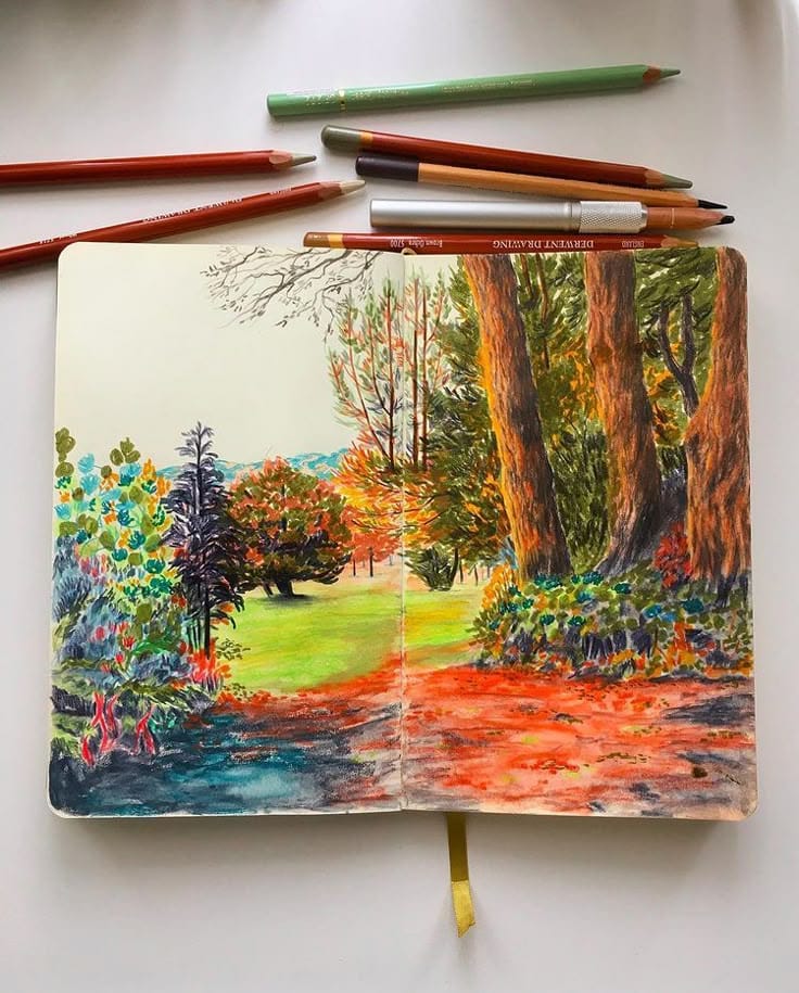 Landscape studies with colored pencils neocolor II 🖼️ 🌳 jacksons_art landscape sketchbook sketchbookdrawing sketchbookart nature _ Instagram Colorful nature sketch in a notebook, surrounded by drawing pencils, depicting a vibrant autumn scene with trees and foliage. | Sky Rye Design Colorful nature sketch in a notebook, surrounded by drawing pencils, depicting a vibrant autumn scene with trees and foliage.