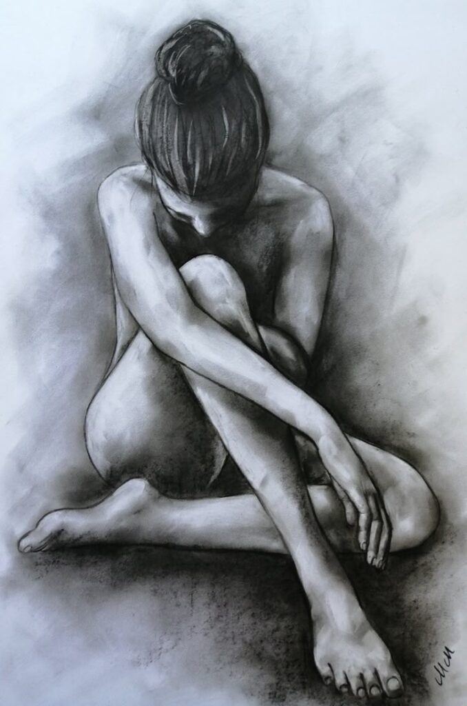 Charcoal drawing of a seated nude woman with head down, highlighting emotional depth and artistic technique in monochrome style.