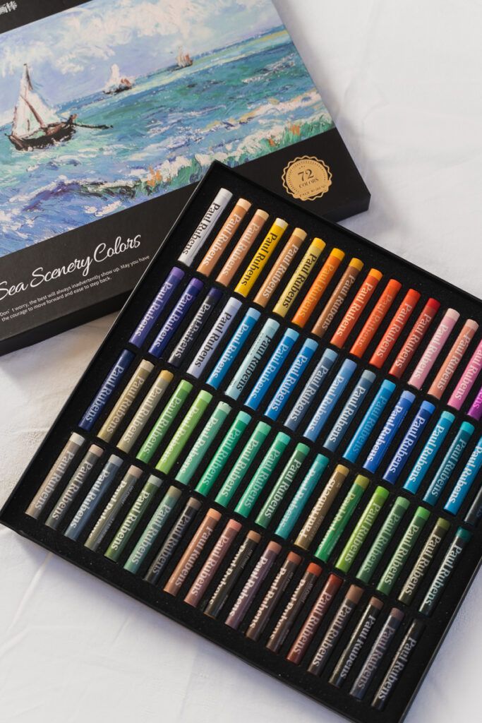 Paul Rubens Oil Pastels Review - Christiana Walther Box of 72 sea scenery colored pastels arranged neatly, ideal for vibrant ocean-themed artwork. | Sky Rye Design Box of 72 sea scenery colored pastels arranged neatly, ideal for vibrant ocean-themed artwork.