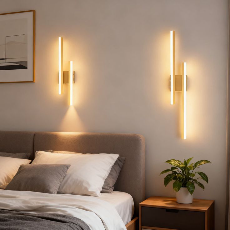 Modern bedroom with vertical wall lights, cozy bed setup, and wooden nightstand with a potted plant. Stylish and serene atmosphere.