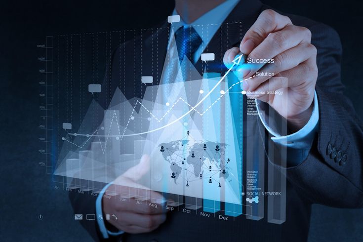 Businessman analyzing rising digital graph, touching screen with data chart overlay, symbolizing growth, strategy, and technology success.