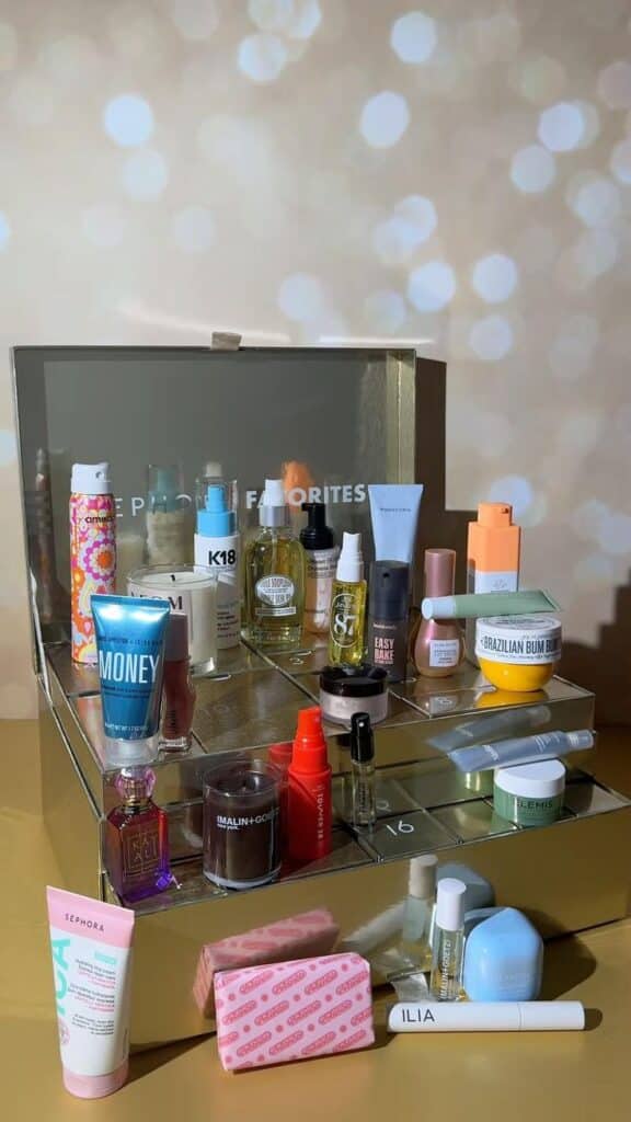 Beauty product collection featuring skincare, haircare, and cosmetics in a reflective display with bokeh background. Perfect for gift ideas.