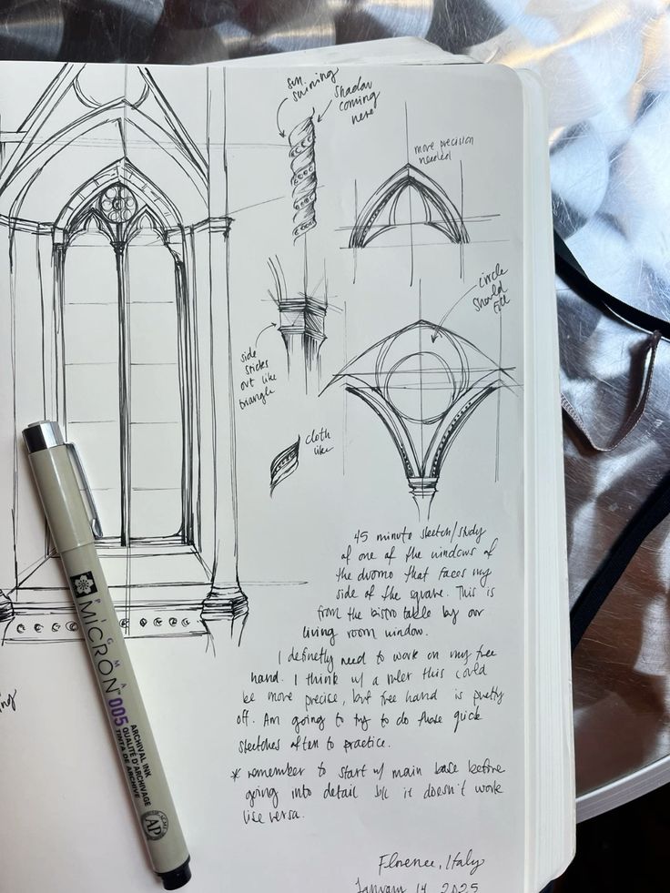 Sketchbook Architectural sketch of a cathedral window with notes and a Micron pen on a notebook. Handmade drawing details arches and columns. | Sky Rye Design Architectural sketch of a cathedral window with notes and a Micron pen on a notebook. Handmade drawing details arches and columns.