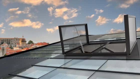 The Three Minutes Rule How Fast Smoke Turns Buildings Lethal Modern rooftop with open skylight window under a cloudy sky, offering a panoramic view of a historic cityscape with red-tiled buildings. | Sky Rye Design Modern rooftop with open skylight window under a cloudy sky, offering a panoramic view of a historic cityscape with red-tiled buildings.