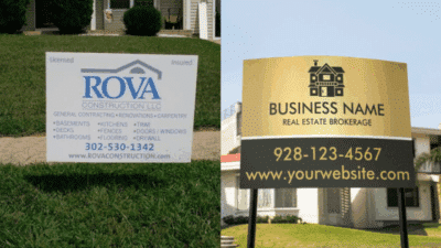 Construction and real estate signs displayed on lawns, showcasing business names and contact details for local contracting and brokerage services.
