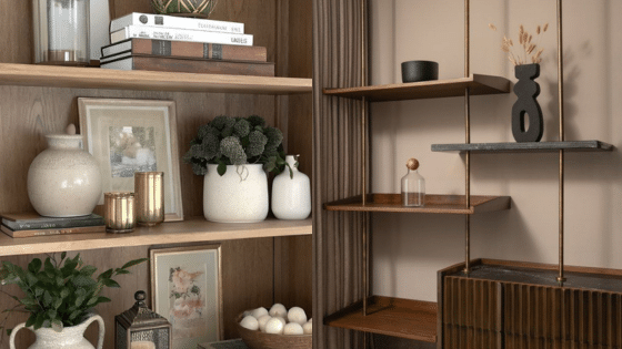 Home decor shelves with books, vases, plants, and decorative items, showcasing a stylish and organized modern interior design.