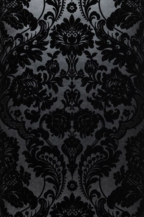 Wallpaper Okina black Intricate black floral damask pattern on a dark background, offering an elegant and sophisticated ornamental design. | Sky Rye Design Intricate black floral damask pattern on a dark background, offering an elegant and sophisticated ornamental design.