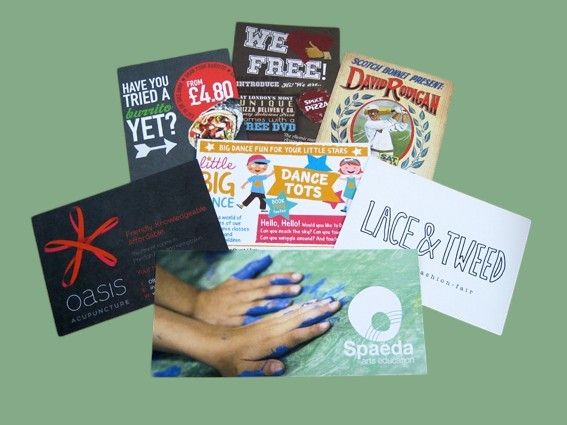A collection of colorful promotional flyers and postcards featuring various businesses and events on a green background.