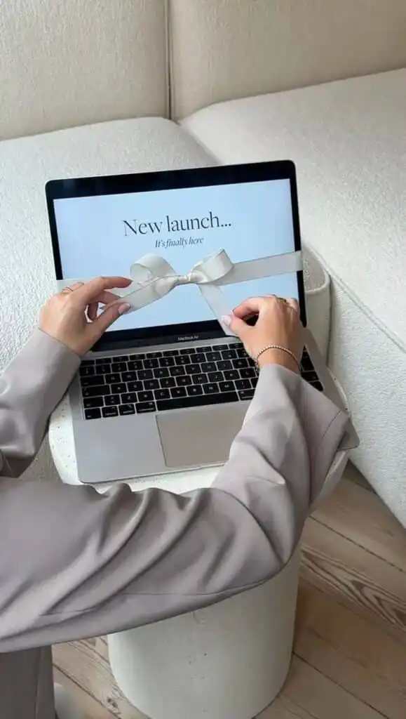 Your Website CalledIt Wants a Makeover Person unveiling laptop screen with New launch... It's finally here text. Celebratory ribbon adds anticipation and excitement. | Sky Rye Design Person unveiling laptop screen with New launch... It's finally here text. Celebratory ribbon adds anticipation and excitement.