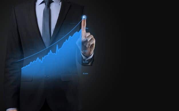 Businessman in a suit points at a glowing upward stock market graph, symbolizing financial growth and success on a dark background.