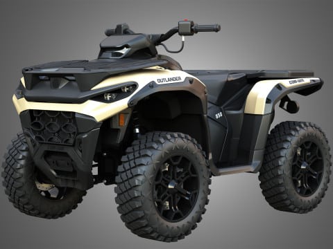 Powerful all-terrain vehicle with rugged tires on a gray background, ideal for off-road adventures and outdoor exploration.