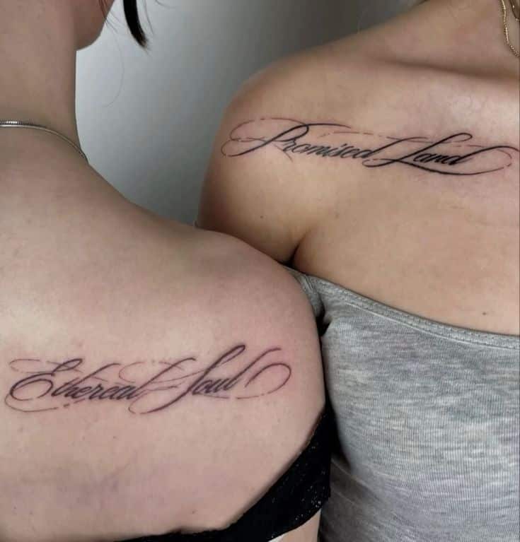 Two shoulders with elegant script tattoos: Ethereal Soul and Promised Land. Minimalist black and white design, close-up view.