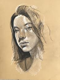 Sketch of a woman on tan paper, showcasing detailed shading and expressive lines, capturing her thoughtful gaze and natural beauty.