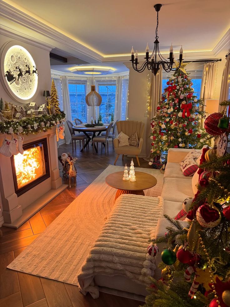 e091a4de-d7c3-4190-a0ac-24ac6097e65e Cozy living room with Christmas tree, festive decor, roaring fireplace, and a dining setup by the window, perfect for holiday gatherings. | Sky Rye Design Cozy living room with Christmas tree, festive decor, roaring fireplace, and a dining setup by the window, perfect for holiday gatherings.
