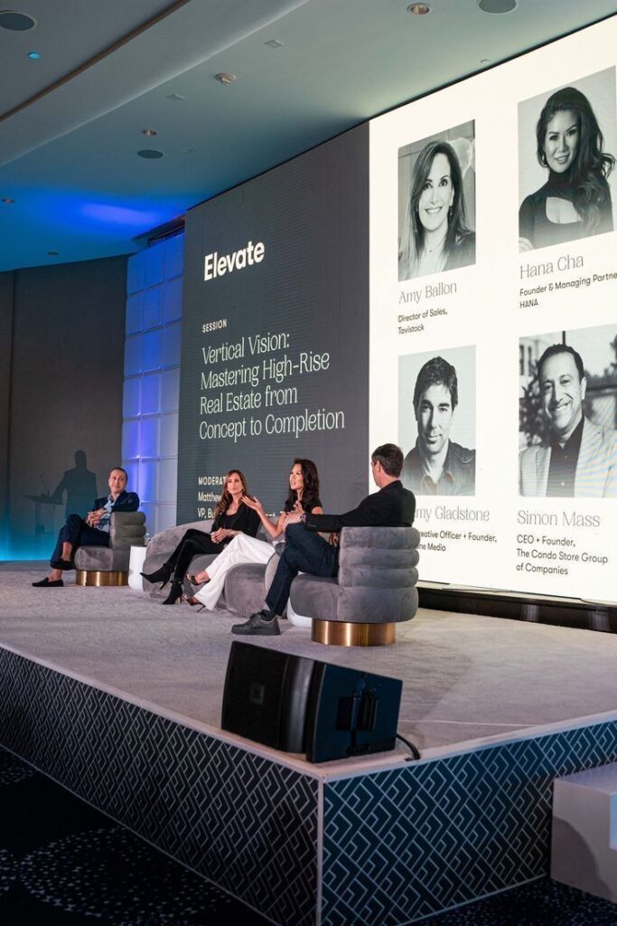 Panel discussion on high-rise real estate at Elevate conference, featuring experts sharing insights on concept to completion.