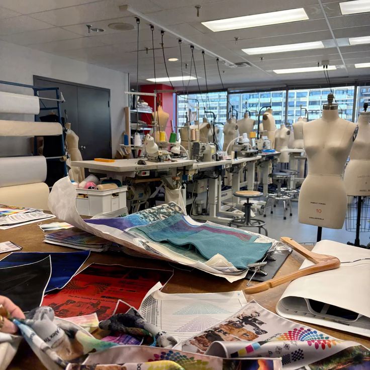 fashion class design_ Fashion design studio with sewing machines, fabric swatches, and mannequins, showcasing a creative workspace for garment creation. | Sky Rye Design Fashion design studio with sewing machines, fabric swatches, and mannequins, showcasing a creative workspace for garment creation.