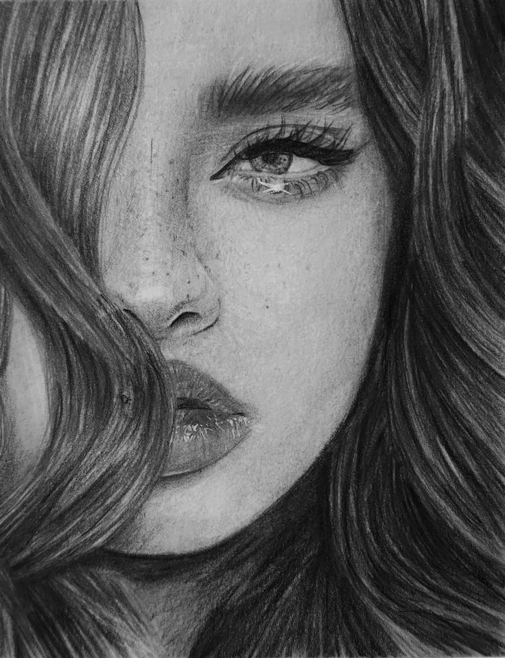 graphite portrait Pencil sketch of a woman's face with detailed features, including expressive eyes and flowing hair, showcasing artistic realism. | Sky Rye Design Pencil sketch of a woman's face with detailed features, including expressive eyes and flowing hair, showcasing artistic realism.