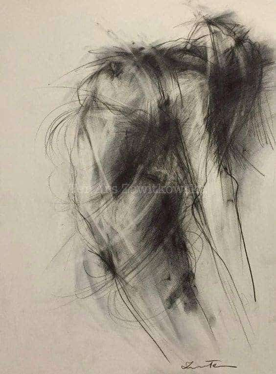 Abstract charcoal drawing depicting a human figure with dynamic lines and bold strokes on a light background, showcasing expressive art.