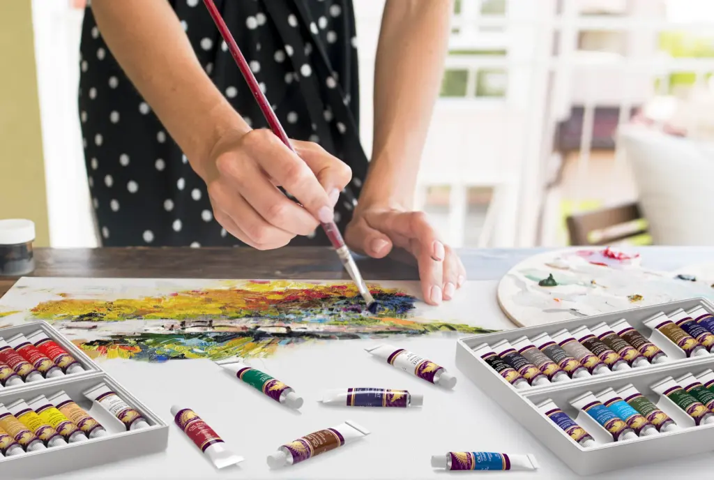 image-5---in-use_db42ff4e-c60c-49bf-abc9-12730c41714e Artist painting on canvas with vibrant colors, surrounded by paint tubes and palette, wearing a polka dot dress. Creative art scene. | Sky Rye Design Artist painting on canvas with vibrant colors, surrounded by paint tubes and palette, wearing a polka dot dress. Creative art scene.