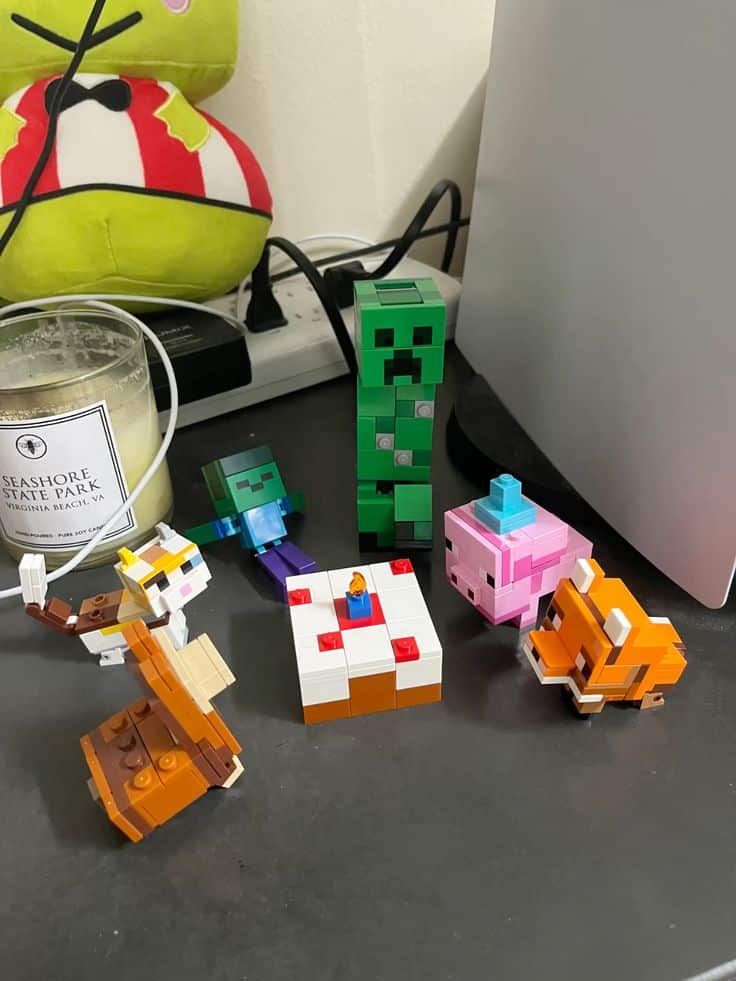 lego minecraft bday party Lego Minecraft figures including a Creeper and animals surround a cake on a table, with a colorful plush toy in the background. | Sky Rye Design Lego Minecraft figures including a Creeper and animals surround a cake on a table, with a colorful plush toy in the background. how to 3d print minecraft