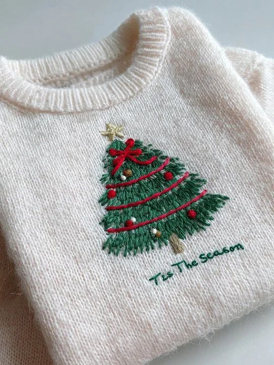 loveylvioa Cream sweater with an embroidered Christmas tree design and the phrase Tis The Season in green. Perfect festive holiday attire. | Sky Rye Design Cream sweater with an embroidered Christmas tree design and the phrase Tis The Season in green. Perfect festive holiday attire.