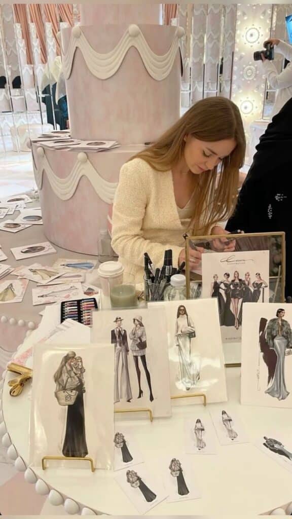 _ Fashion designer illustrating in a studio surrounded by sketches and art supplies, capturing the creative process and stylistic inspiration. | Sky Rye Design Fashion designer illustrating in a studio surrounded by sketches and art supplies, capturing the creative process and stylistic inspiration.