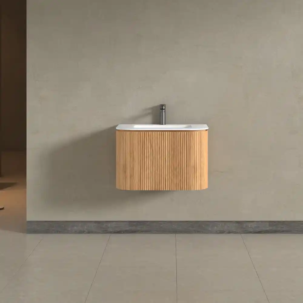 Modern wooden vanity with integrated sink against a gray wall, showcasing minimalist bathroom design and contemporary style.
