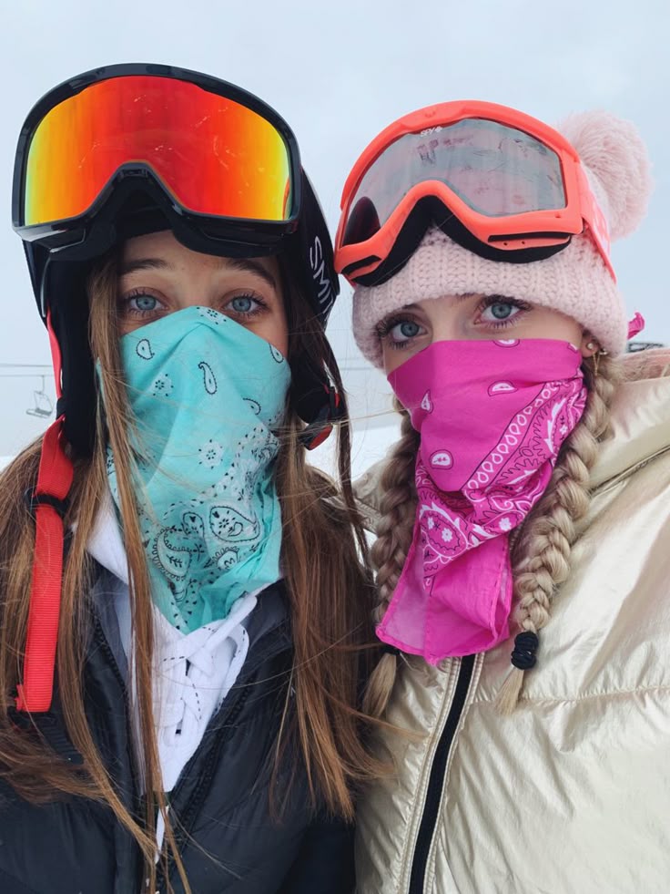 winter Two snowboarders wearing goggles and colorful bandanas, ready for winter fun on the snowy slopes. | Sky Rye Design Two snowboarders wearing goggles and colorful bandanas, ready for winter fun on the snowy slopes.