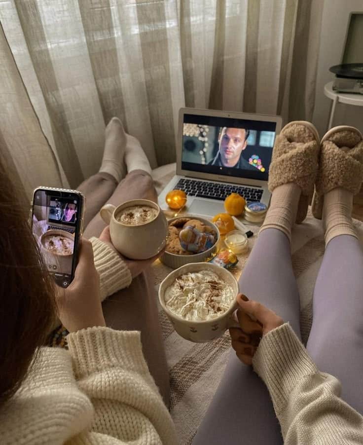 ☕✨ cr_ moreisokna on insta Cozy setup with hot chocolate, cookies, and a movie on a laptop. Two people relaxing in comfy socks, watching and photographing the scene. | Sky Rye Design Cozy setup with hot chocolate, cookies, and a movie on a laptop. Two people relaxing in comfy socks, watching and photographing the scene.