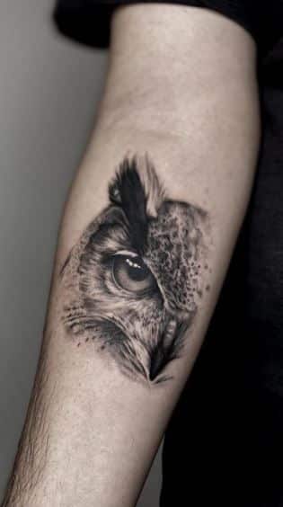 _ - 2026-01-10T233727901 Realistic owl tattoo on a person's forearm, showcasing intricate details and shading in black and gray ink. | Sky Rye Design Realistic owl tattoo on a person's forearm, showcasing intricate details and shading in black and gray ink.