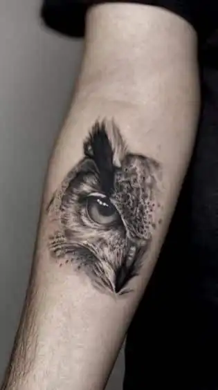 _ - 2026-01-10T233727901 Realistic owl tattoo on a person's forearm, showcasing intricate details and shading in black and gray ink. | Sky Rye Design Realistic owl tattoo on a person's forearm, showcasing intricate details and shading in black and gray ink.