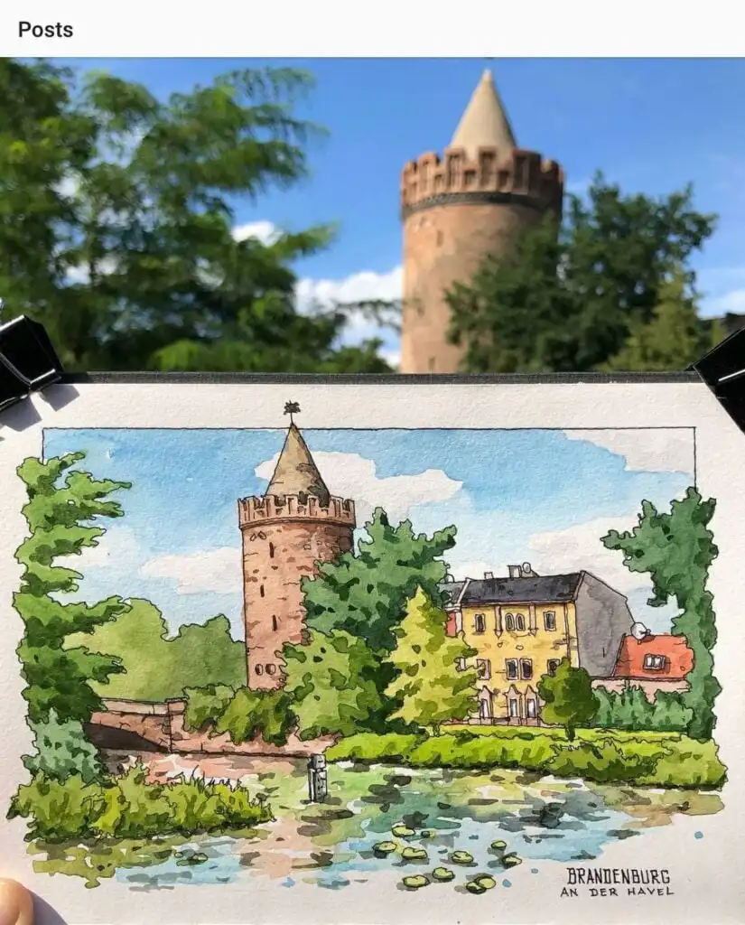 Watercolor of Brannenburg tower against the real backdrop, showcasing artistic interpretation and historical architecture.