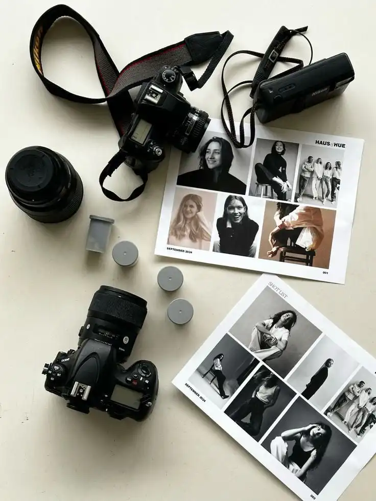 861368f6-0082-4856-9079-90f7d6439ca2 Flat lay of cameras, lenses, and fashion photo magazines, ideal for photography enthusiasts and creative inspiration. | Sky Rye Design Flat lay of cameras, lenses, and fashion photo magazines, ideal for photography enthusiasts and creative inspiration.