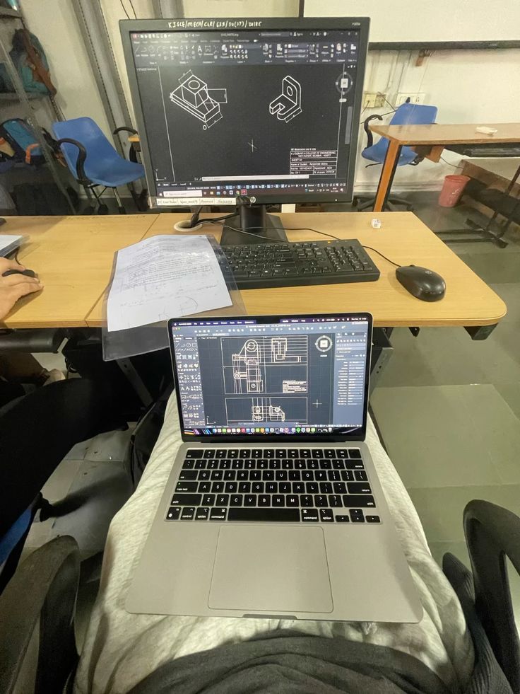 8cd0be19667c28e5e8aa5f4942307920 Dual computer setup with engineering software on screens in a workspace, showcasing CAD designs and technical drawings. | Sky Rye Design Dual computer setup with engineering software on screens in a workspace, showcasing CAD designs and technical drawings.