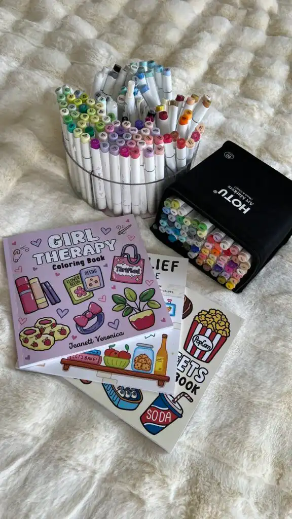 Cute Coloring Aesthetic Colorful markers and creative coloring books on a cozy blanket, perfect for art therapy and relaxation. | Sky Rye Design Colorful markers and creative coloring books on a cozy blanket, perfect for art therapy and relaxation.