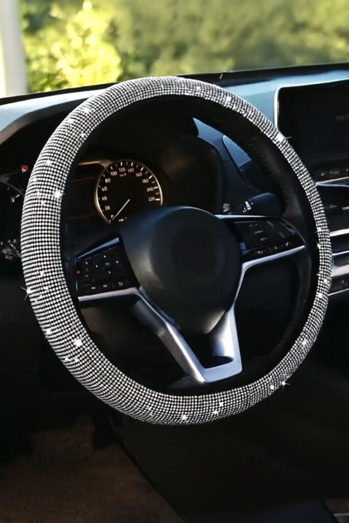 Elegant Steering Wheel Cover Comfort and Style Elegant black car steering wheel with rhinestone cover, enhancing interior style and adding luxury to vehicle design. | Sky Rye Design Elegant black car steering wheel with rhinestone cover, enhancing interior style and adding luxury to vehicle design.