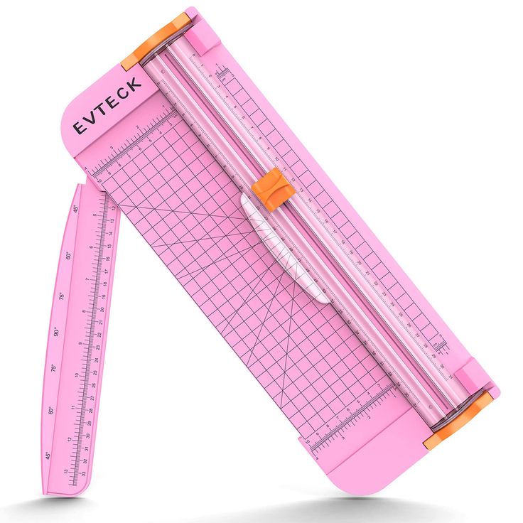 Version 100 Pink paper cutter with grid lines and orange accents, ideal for crafting and precision cutting. | Sky Rye Design Pink paper cutter with grid lines and orange accents, ideal for crafting and precision cutting.